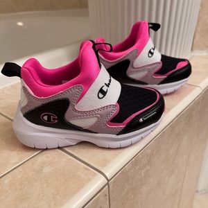 Size 6T  champion shoe.
